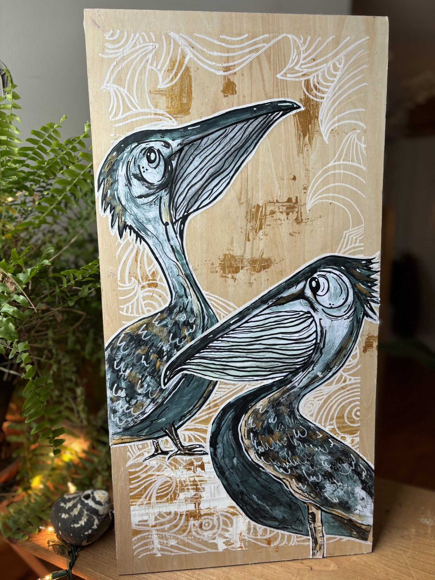 Pelicans on wood